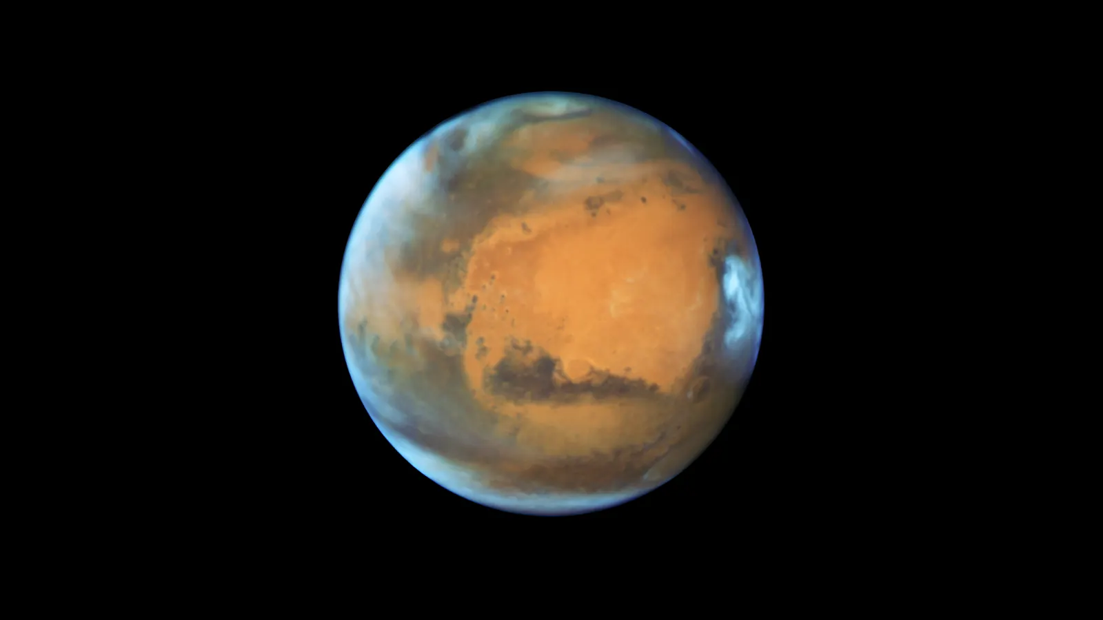 Mars with its polar cap and clouds, imaged by the Hubble Space Telescope on May 12, 2016, close to that year's opposition