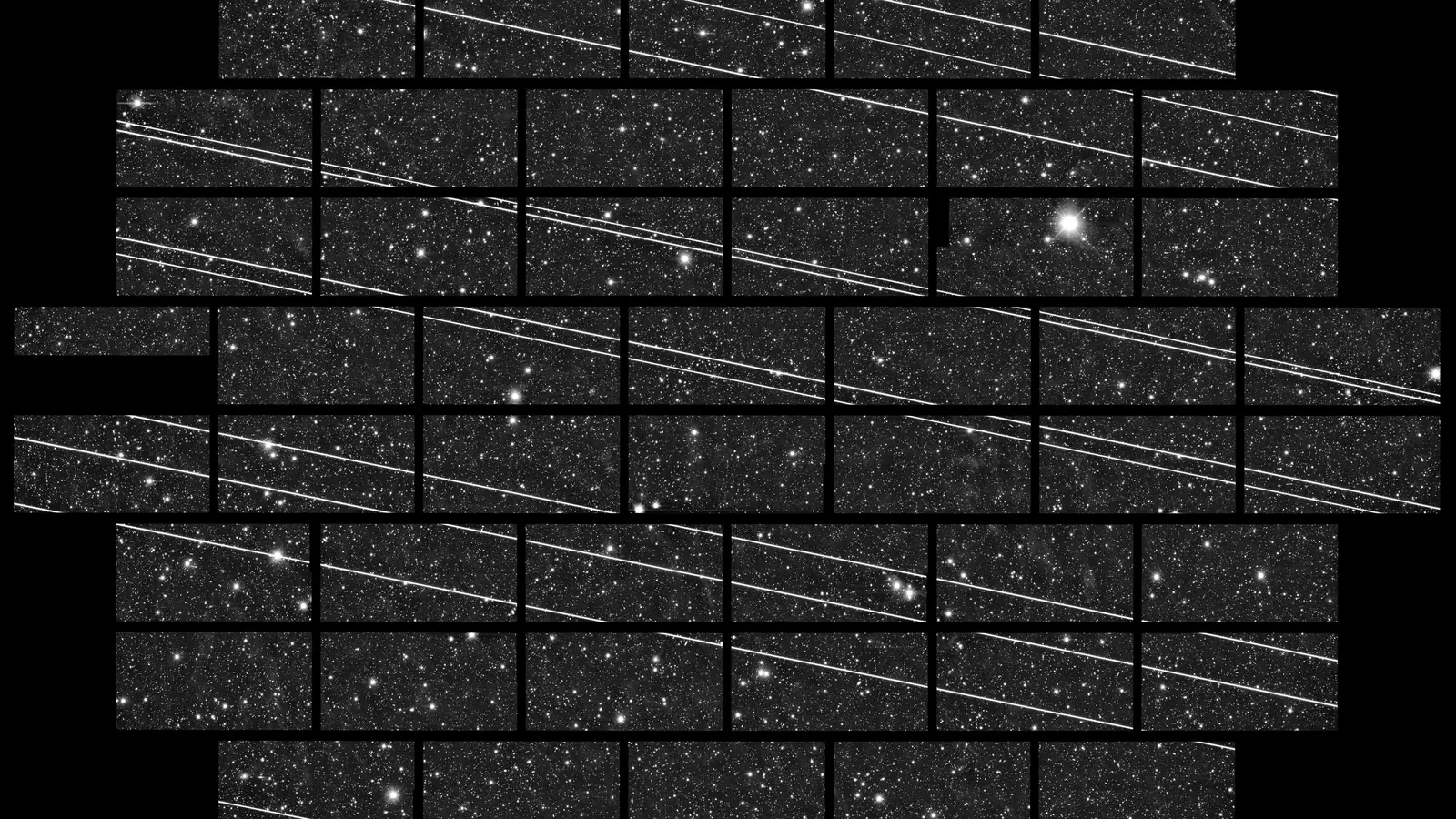 Bright diagonal streaks from the second batch of Starlink satellites crossing a 333-second DECam exposure at Cerro Tololo in November 2019, broken where the camera's CCD chips meet