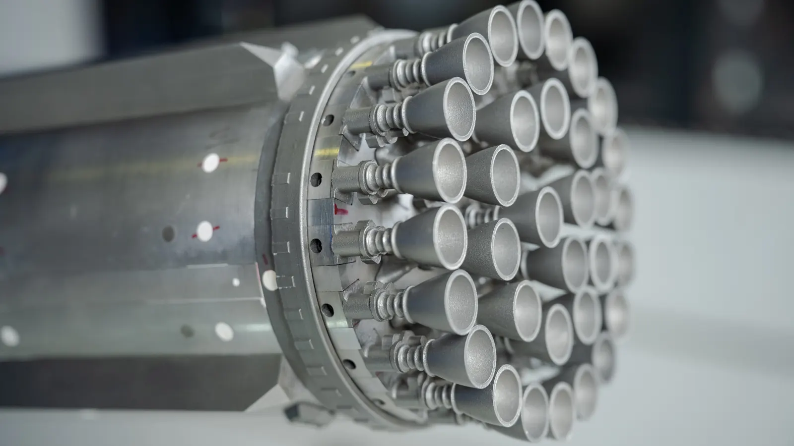 The engine end of a 1.2% scale model of SpaceX's Super Heavy Version 3 booster, a cluster of small nozzles, photographed at NASA's Ames Research Center, where it was tested in a wind tunnel to study the forces on the booster during re-entry